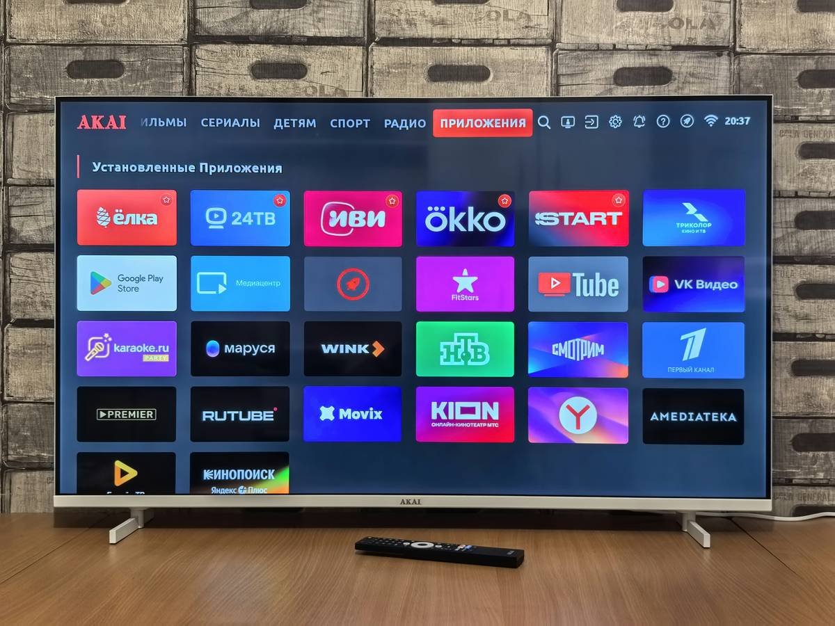 Smart TVs showing different streaming apps installation screens