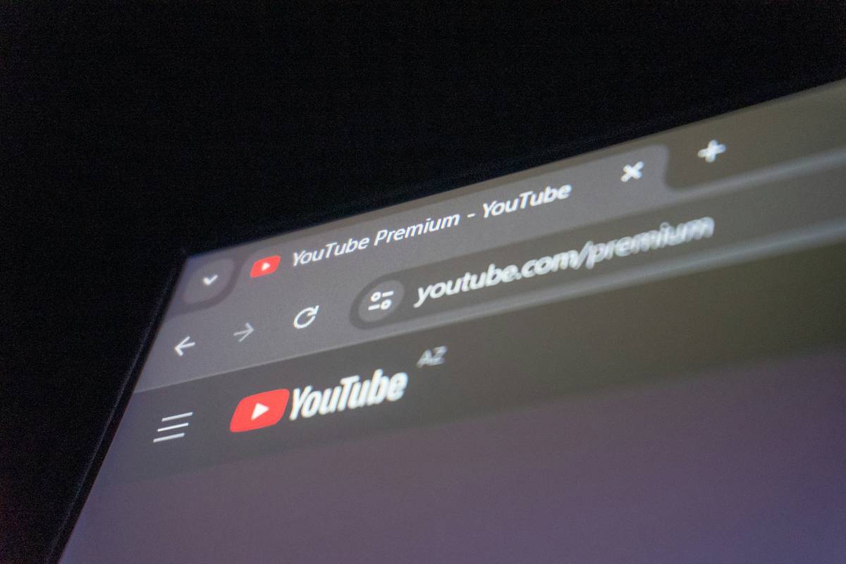 A person comparing streaming service prices on their laptop